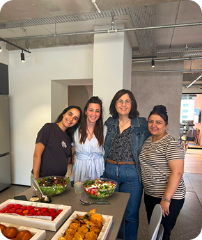 Oktopost team sharing a meal, embodying our B2B social media and employee advocacy culture.